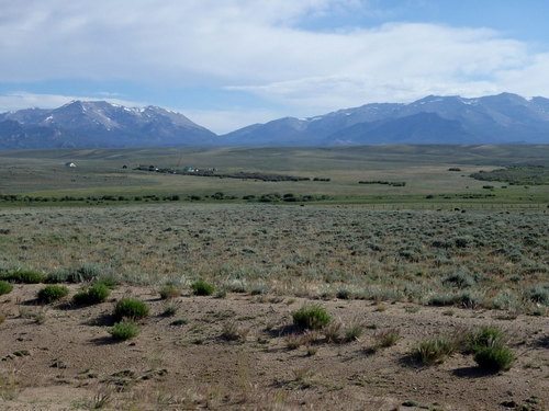 GDMBR: Looking northwest at ranch buildings in a low wind draw.